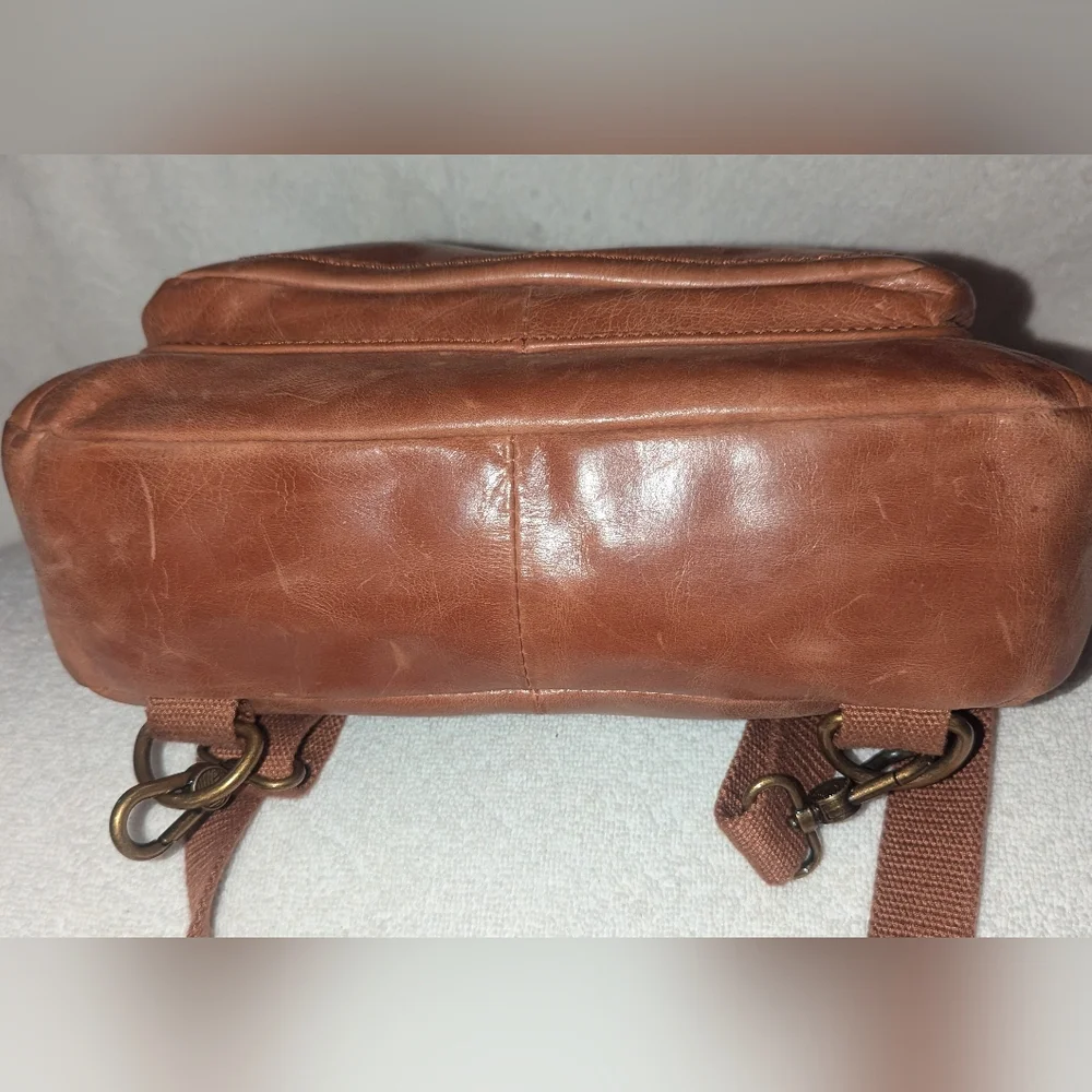 The Sak Ventura Convertible Tan Embossed Leather Backpack
